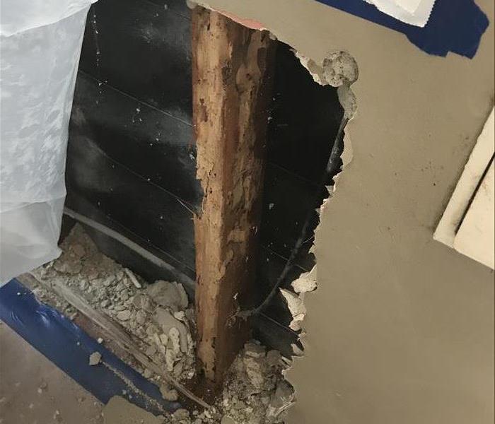 Fire damage being discovered past drywall