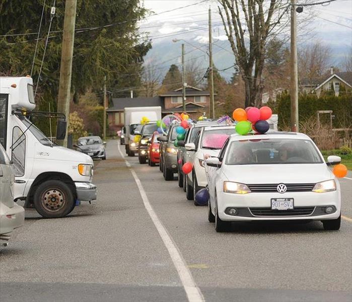 cars lined up to celebrate birthday